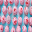 Delicious Pink Strawberry Ice Cream Scoops on Blue Background