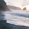 Tranquil Coastal Sunset: Serene Beach Waves and Majestic Cliffs