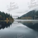 Tranquil Misty Lake Surrounded by Autumn Forest Reflections