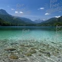 Tranquil Mountain Lake with Crystal Clear Waters and Scenic Landscape