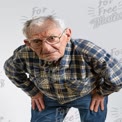 Wise Elderly Man with Thoughtful Expression in Casual Attire