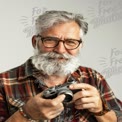 Creative Senior Photographer with Vintage Camera and Stylish Beard