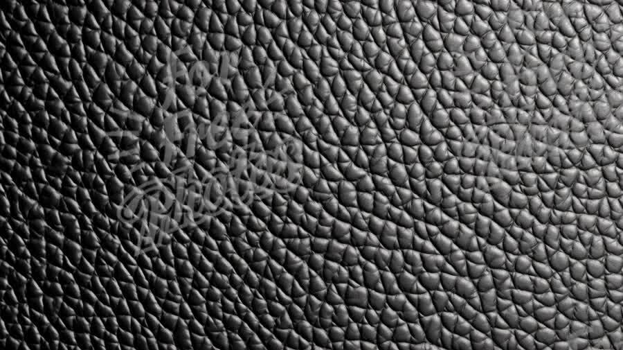 Close-Up of Textured Black Leather Surface for Fashion and Design Backgrounds